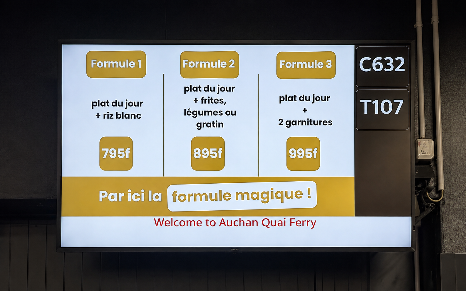 Écran Philips PRO affichant le flux Qmatic Orchestra — Auchan Quai Ferry
